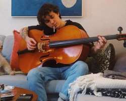 In addition to being a YouTube star, he can also play the guitar.